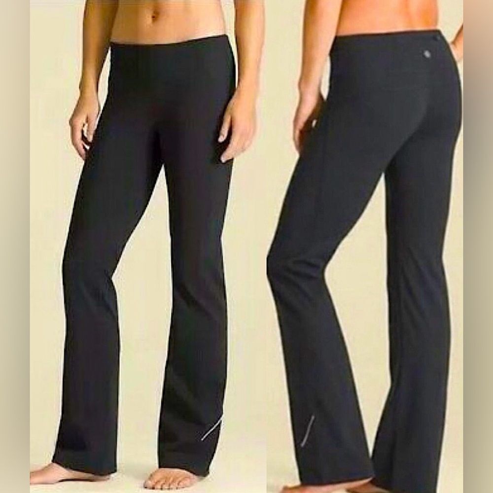 Athleta Power Kick mid rise boot cut yoga leggings with tan stitching size MT